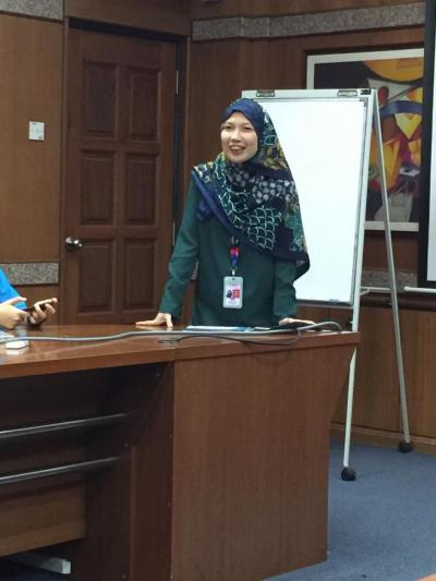 One of the airport staff giving an introduction about the Senai Airport